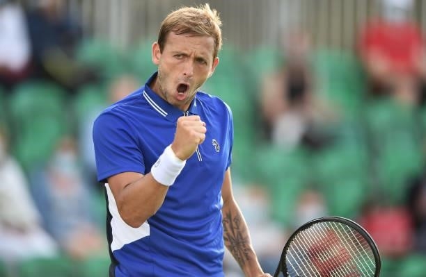 Daniel Evans of Great Britain celebrates as he plays against Denis Kudla of United States during the men’s singles match on day seven at Nottingham...