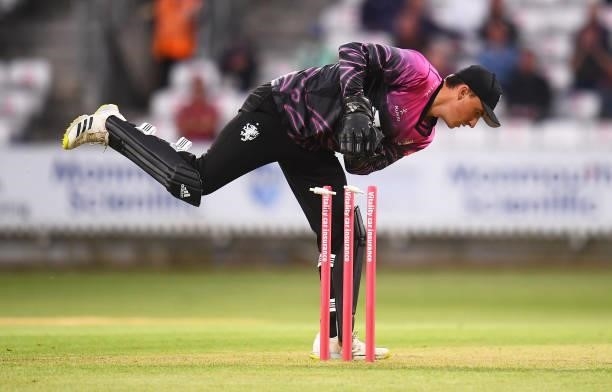 Tom Banton of Somerset removes the bails during the Vitality T20 Blast match between Somerset and Surrey at The Cooper Associates County Ground on...