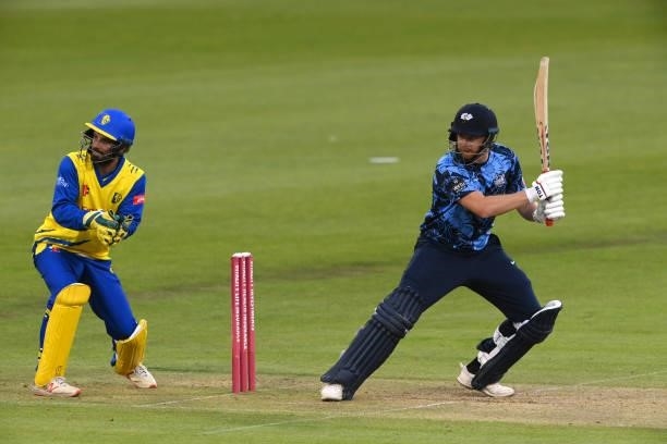 Yorkshire batsman Jonathan Bairstow in batting action watched by Ned Eckersley during the Vitality T20 Blast match between Durham Cricket and...