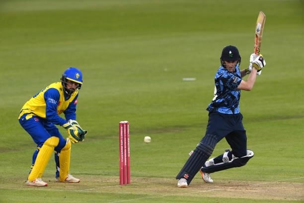 Yorkshire batsman Harry Brook in batting action watched by Ned Eckersley during the Vitality T20 Blast match between Durham Cricket and Yorkshire...