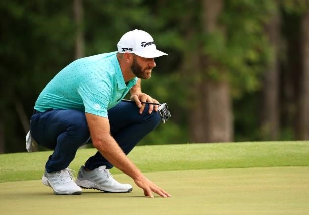 Dustin Johnson lines up a putt on the 11th green during the second round of the Palmetto Championship at Congaree on June 11, 2021 in Ridgeland,...