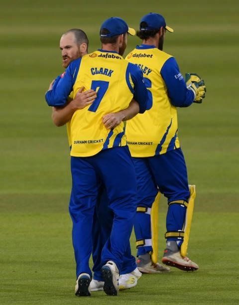 Durham bowler Ben Raine celebrates with Graham Clark after taking the wicket of Will Fraine during the Vitality T20 Blast match between Durham...