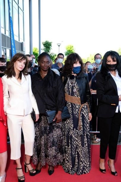 Anne Parillaud, Aïssa Maïga, Isabelle Adjani and Yamina Benguigui pose on the red carpet during the opening ceremony of the Plurielles Festival at...