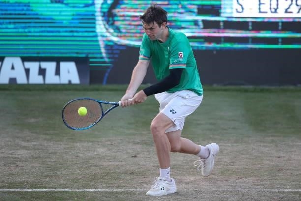 Jurij Rodionov of Austria plays a backhand during his match against Alex De Minaur of Australia during day 5 of the MercedesCup at Tennisclub...