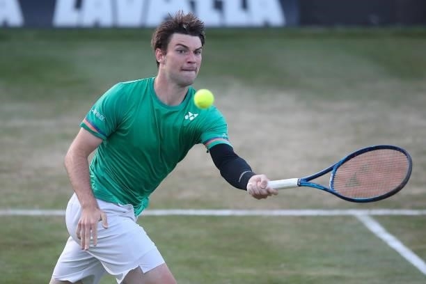 Jurij Rodionov of Austria plays a forehand during his match against Alex De Minaur of Australia during day 5 of the MercedesCup at Tennisclub...