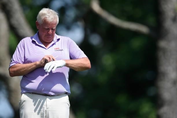 Colin Montgomerie of Scotland prepares to hit his tee shot on the second hole during the first round of the American Family Insurance Championship at...