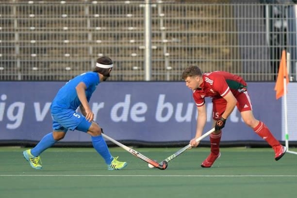 Mikhail Proskuriakov of Russia, Rhys Bradshaw of Wales during the Euro Hockey Championships Men match between Wales and Russia at Wagener Stadion on...