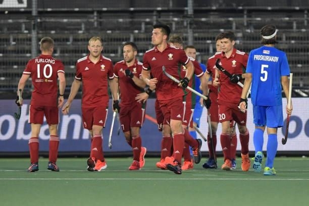 Rhodri Furlong of Wales and Jolyon Morgan of Wales celebrating with their teammates during the Euro Hockey Championships Men match between Wales and...