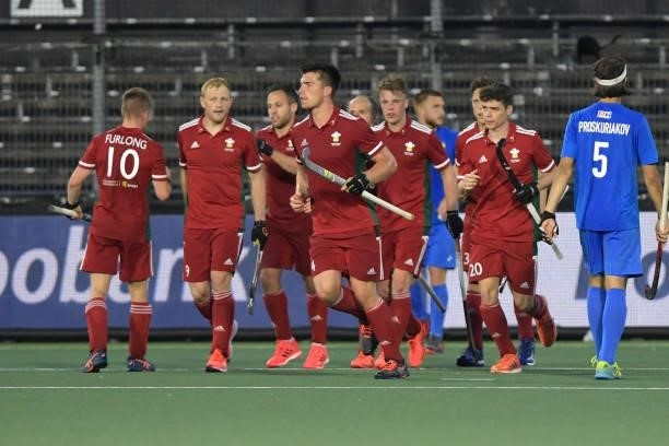 Rhodri Furlong of Wales and Jolyon Morgan of Wales celebrating with their teammates during the Euro Hockey Championships Men match between Wales and...
