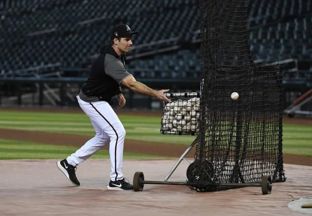 Co-Hitting coach Drew Hedman 66 of the Arizona Diamondbacks tosses batting practice prior to a game against the Los Angeles Angels at Chase Field on...