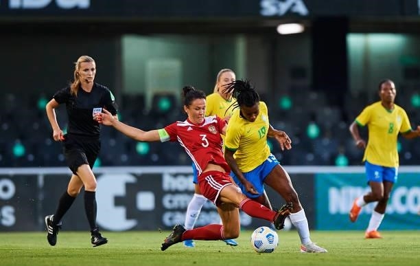 Ludmila Silva of Brazil competes for the ball with Anna Kozhnikova of Russia during the Women's International friendly match between Brazil and...