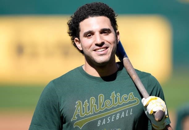 Ramón Laureano of the Oakland Athletics looks on smiling during batting practice prior to his game against the Kansas City Royals at RingCentral...