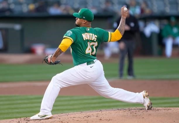 Frankie Montas of the Oakland Athletics pitches against the Kansas City Royals in the top of the second inning at RingCentral Coliseum on June 10,...