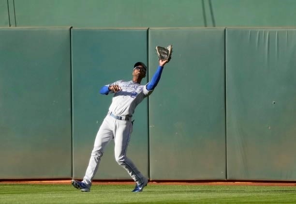 Michael A. Taylor of the Kansas City Royals catches a fly ball off the bat of Jed Lowrie of the Oakland Athletics in the bottom of the first inning...