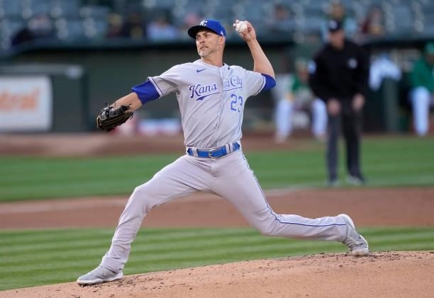 Mike Minor of the Kansas City Royals pitches against the Oakland Athletics in the bottom of the first inning at RingCentral Coliseum on June 10, 2021...