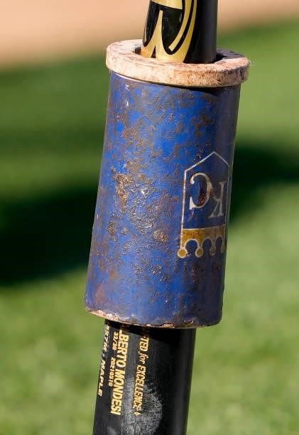 Detailed view of a bat belonging to Adalberto Mondesí of the Kansas City Royals with the Royals bat weight on the end during batting practice prior...