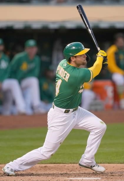 Chad Pinder of the Oakland Athletics bats against the Kansas City Royals in the bottom of the six inning at RingCentral Coliseum on June 10, 2021 in...