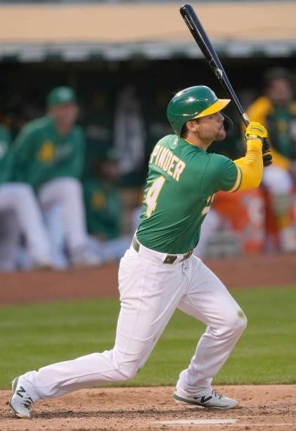 Chad Pinder of the Oakland Athletics bats against the Kansas City Royals in the bottom of the six inning at RingCentral Coliseum on June 10, 2021 in...