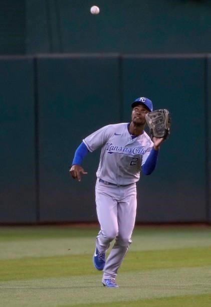 Michael A. Taylor of the Kansas City Royals catches a fly ball off the bat of Chad Pinder of the Oakland Athletics in the bottom of the six inning at...