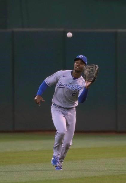 Michael A. Taylor of the Kansas City Royals catches a fly ball off the bat of Chad Pinder of the Oakland Athletics in the bottom of the six inning at...