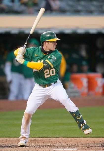 Mark Canha of the Oakland Athletics bats against the Kansas City Royals in the bottom of the six inning at RingCentral Coliseum on June 10, 2021 in...