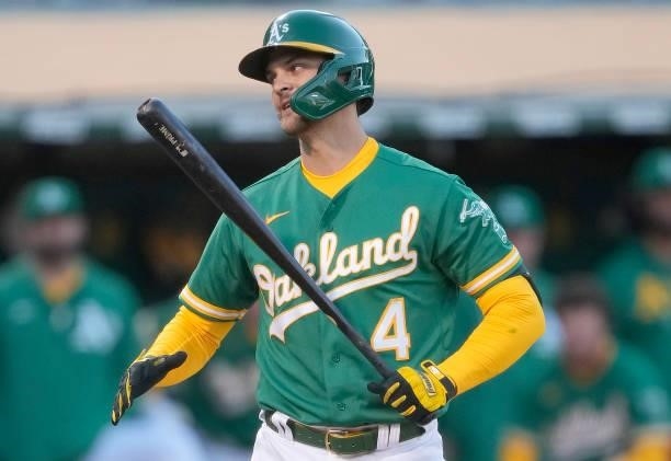 Chad Pinder of the Oakland Athletics reacts after he was called out on strike against the Kansas City Royals in the bottom of the fourth inning at...