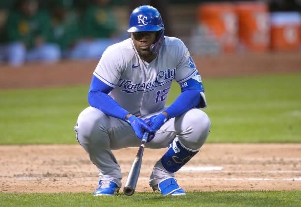 Jorge Soler of the Kansas City Royals stoops down and looks on waiting for a replay call by the umpires against the Oakland Athletics in the top of...