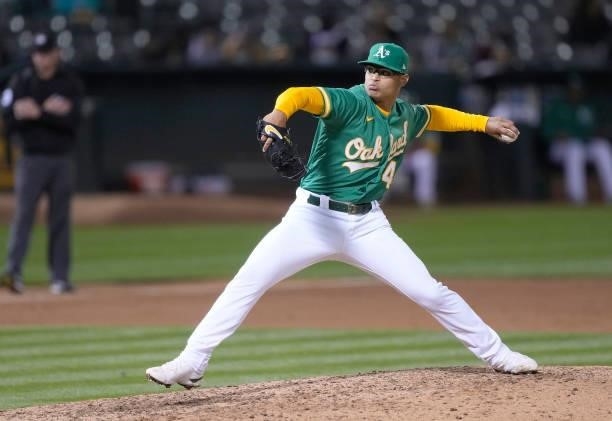 Jesus Luzardo of the Oakland Athletics pitches against the Kansas City Royals in the top of the eighth inning at RingCentral Coliseum on June 10,...