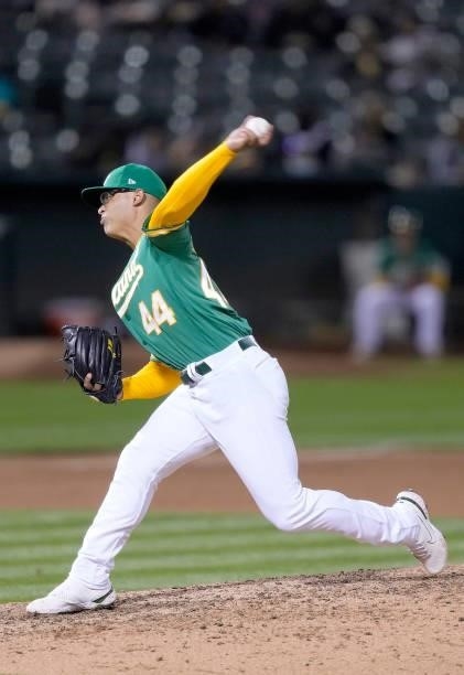 Jesus Luzardo of the Oakland Athletics pitches against the Kansas City Royals in the top of the eighth inning at RingCentral Coliseum on June 10,...