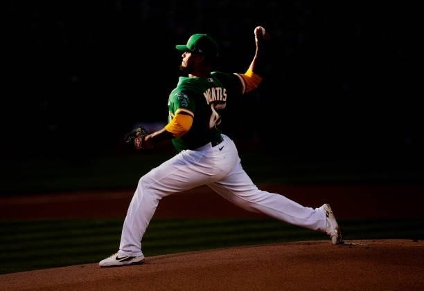 Frankie Montas of the Oakland Athletics pitches against the Kansas City Royals in the top of the first inning at RingCentral Coliseum on June 10,...