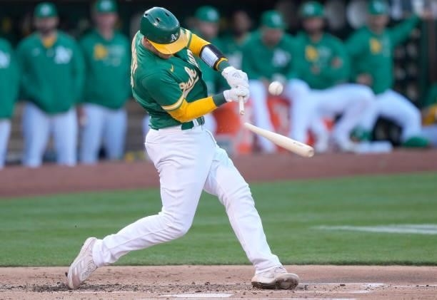 Sean Murphy of the Oakland Athletics breaks hit bat while popping out to second base against the Kansas City Royals in the bottom of the second...
