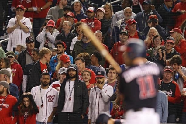 Fans watch as the San Francisco Giants play against the Washington Nationals during the ninth inning at Nationals Park on June 11, 2021 in...