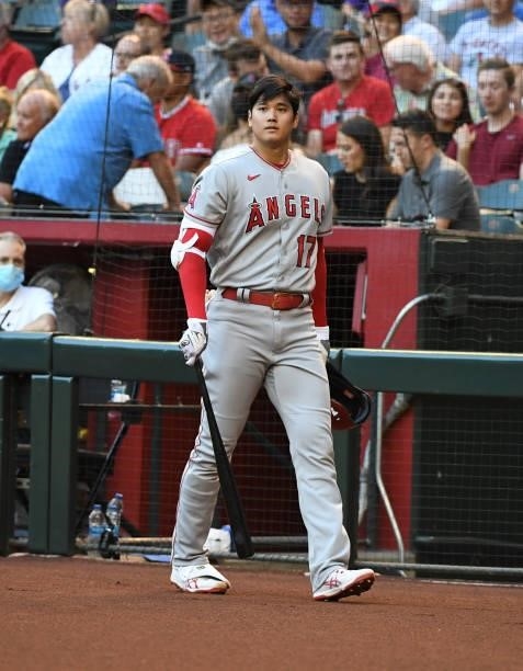 Shohei Ohtani of the Los Angeles Angels walks to the on deck circle prior to an at bat against the Arizona Diamondbacks during the first inning at...