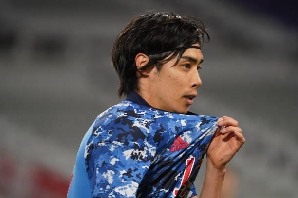 Junya Ito of Japan reacts during the international friendly match between Japan and Serbia at Noevir Stadium Kobe on June 11, 2021 in Kobe, Aichi,...