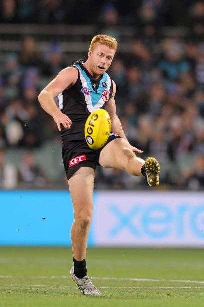 Willem Drew of the Power kicks the ball during the round 13 AFL match between the Port Adelaide Power and the Geelong Cats at Adelaide Oval on June...