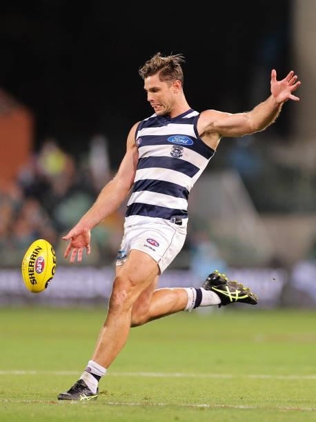 Tom Hawkins of the Cats kicks the ball during the round 13 AFL match between the Port Adelaide Power and the Geelong Cats at Adelaide Oval on June...