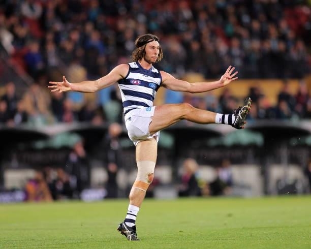 Jack Henry of the Cats kicks the ball during the round 13 AFL match between the Port Adelaide Power and the Geelong Cats at Adelaide Oval on June 10,...