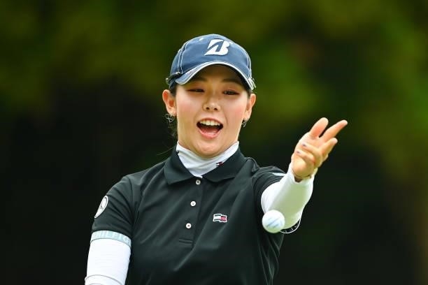 Yuri Yoshida of Japan drops the ball after posing for photographers on the 1st green during the third round of the Ai Miyazato Suntory Ladies Open at...