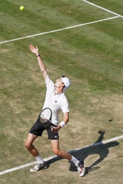 Ugo Humbert of France makes a service during his match against Felix Auger-Aliassime of Canada during day 5 of the MercedesCup at Tennisclub...