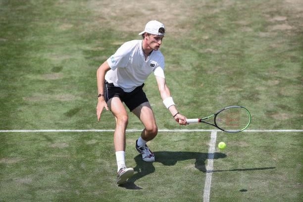 Ugo Humbert of France plays a forehand during his match against Felix Auger-Aliassime of Canada during day 5 of the MercedesCup at Tennisclub...