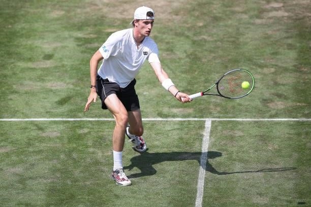 Ugo Humbert of France plays a forehand during his match against Felix Auger-Aliassime of Canada during day 5 of the MercedesCup at Tennisclub...