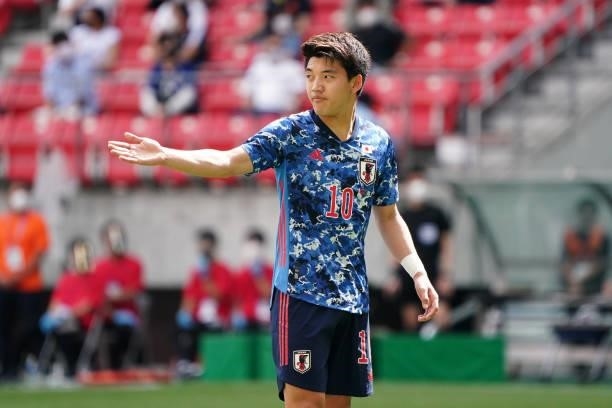 Ritsu Doan of Japan U-24 gestures during the international friendly match between Japan U-24 and Jamaica at the Toyota Stadium on June 12, 2021 in...