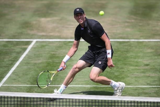 Sam Querry of United States of America plays a forehand during his match against Dominic Stricker of Switzerland during day 5 of the MercedesCup at...