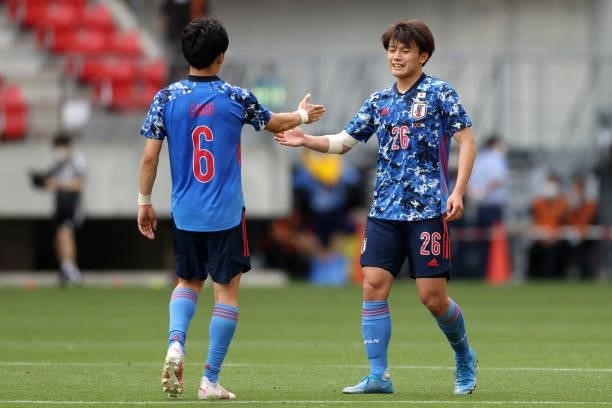 Ayase Ueda and Wataru Endo of Japan U-24 celebrate their 4-0 victory in the international friendly match between Japan U-24 and Jamaica at the Toyota...