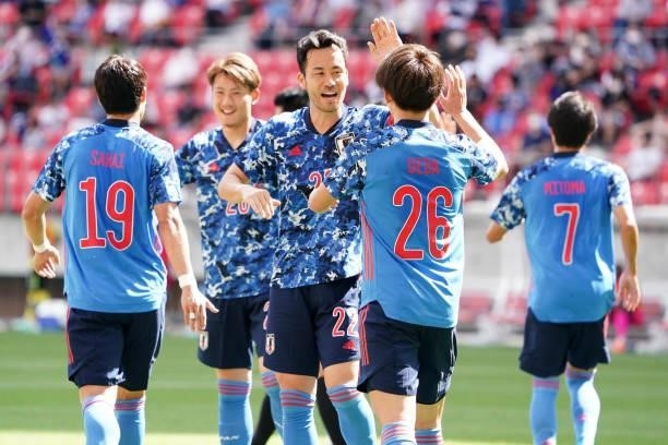 Ayase Ueda of Japan U-24 celebrates scoring his side's third goal with his team mates during the international friendly match between Japan U-24 and...