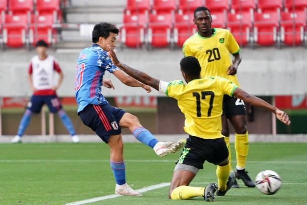 Ritsu Doan of Japan U-24 scores his side's fourth goal during the international friendly match between Japan U-24 and Jamaica at the Toyota Stadium...