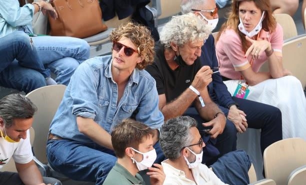 Elie Chouraqui and his son Cesar Chouraqui attend the men's semifinals during day 13 of the 2021 Roland-Garros, French Open, a Grand Slam tennis...