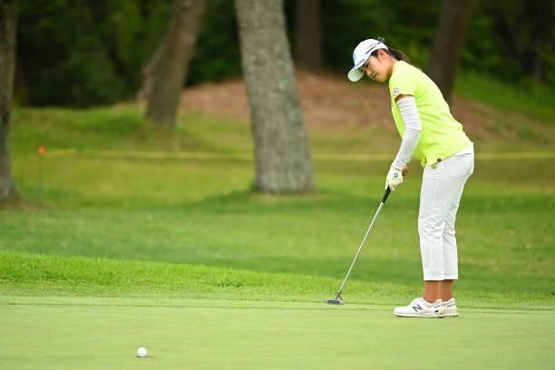 Mone Inami of Japan holes the birdie putt on the 17th green during the third round of the Ai Miyazato Suntory Ladies Open at Rokko Kokusai Golf Club...
