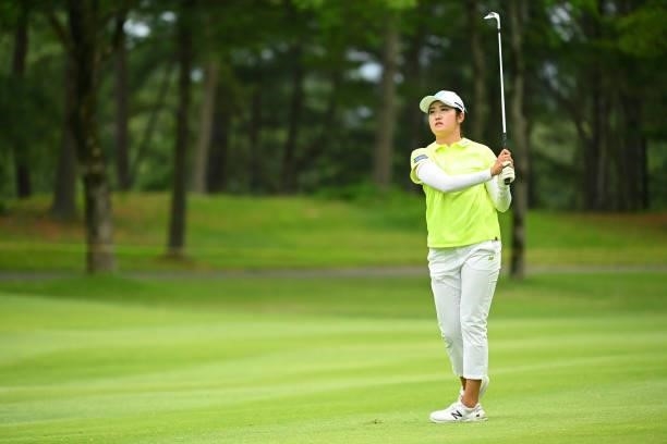 Mone Inami of Japan hits her second shot on the 17th hole during the third round of the Ai Miyazato Suntory Ladies Open at Rokko Kokusai Golf Club on...
