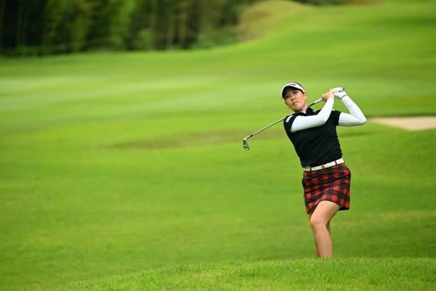 Mami Fukuda of Japan hits her second shot on the 9th hole during the third round of the Ai Miyazato Suntory Ladies Open at Rokko Kokusai Golf Club on...
